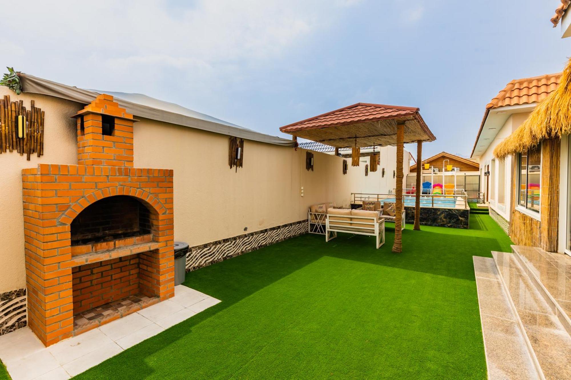 شاليهات الكوخ السويسري وأكوابارك Villa Ash Shishah Esterno foto